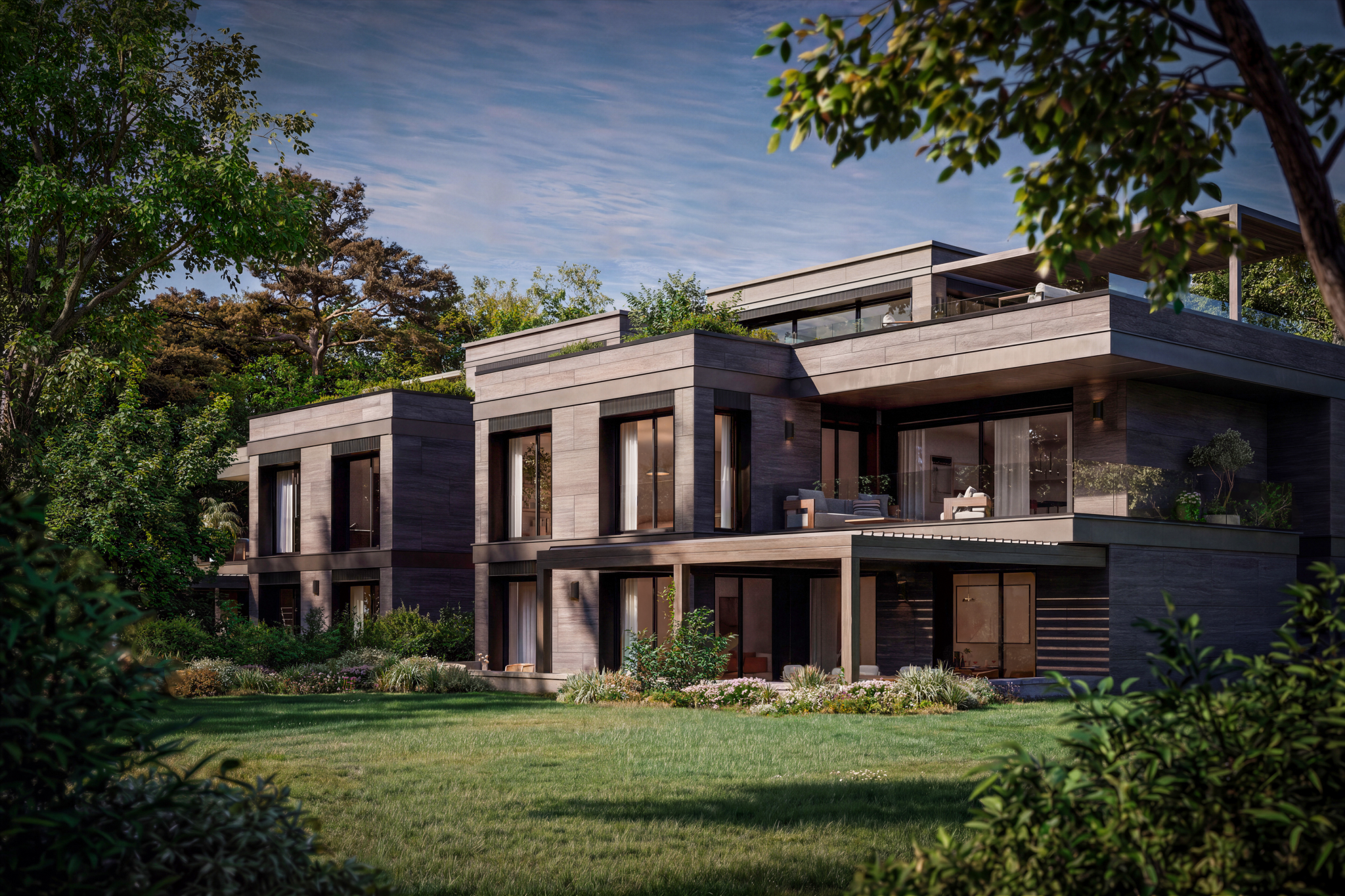 Vue extérieure d’une villa contemporaine avec jardin paysager et architecture haut de gamme.